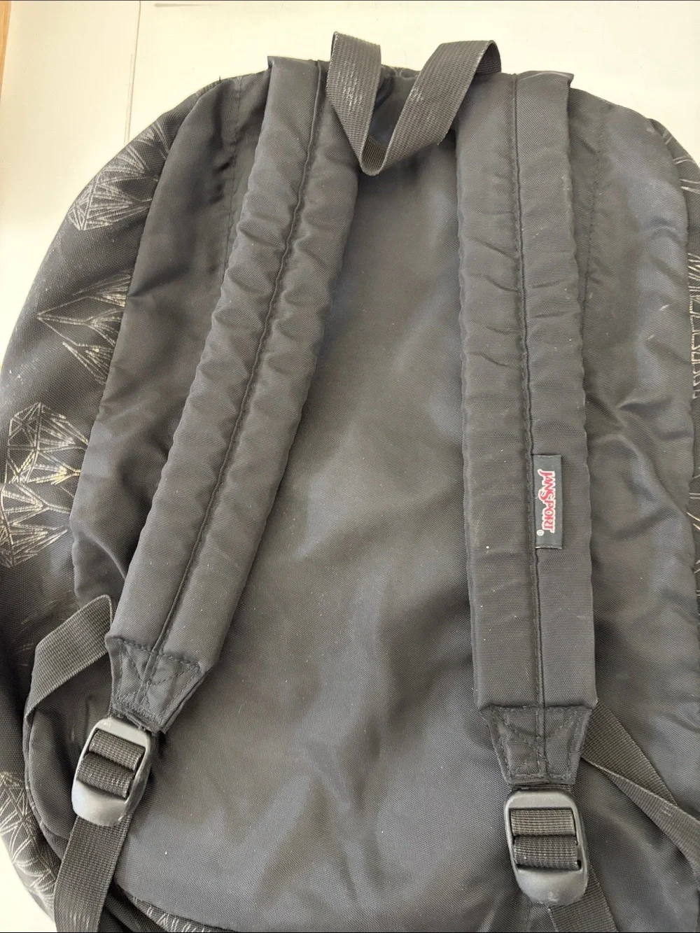 Jansport Black Backpack with Geometric Diamond Print